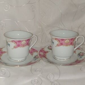 Two Beautiful Dainty Cups And Saucers